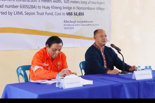 LXML Sepon Hands Bitumen Road to Nonesomboun Community, Vilabouly district.